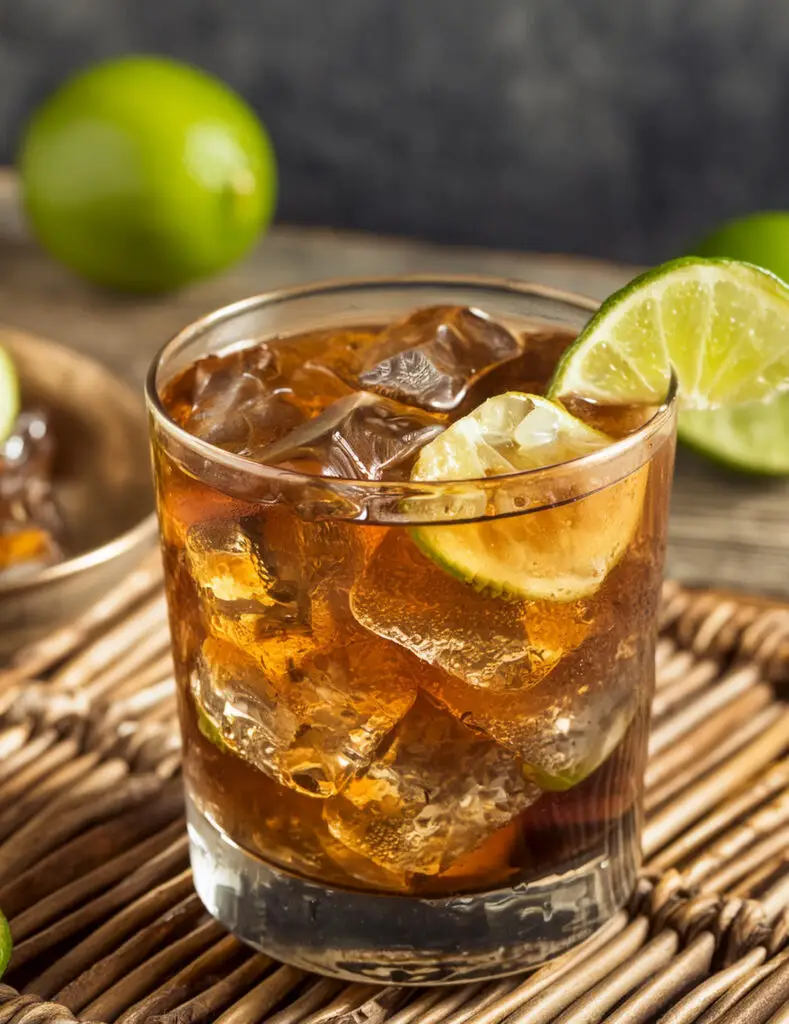 A close up image of a 52North Dark and Stormy cocktail on a table counter.